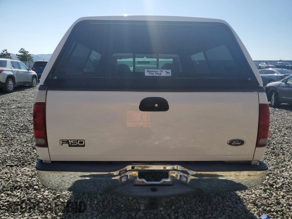2004 Ford F-150 XL with VIN 2FTRF18W54CA36334, listed as a Copart auction lot 63464375 with 253,805 mi miles and Salvage title. Bid and sale history available at DreamBid. Image 6.