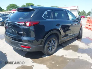 2023 Mazda CX-9 Touring with VIN JM3TCBCY2P0651679, listed as a IAAI auction lot 42002920 with 67,791 mi miles and . Bid and sale history available at DreamBid. Image 4.