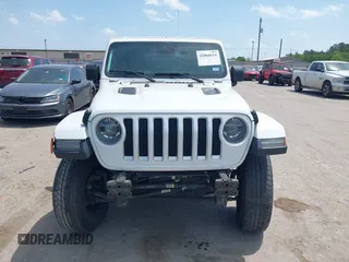2018 Jeep Wrangler Unlimited Sahara z VIN 1C4HJXEG0JW245118, wystawiony jako IAAI lot #42066614 z przebiegiem 83 743 mil mil oraz . Historia ofert i sprzedaży dostępna na DreamBid. Obrazek 13.