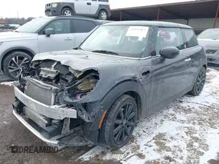 2020 MINI Hardtop Cooper S z VIN WMWXR5C07L2L60692, wystawiony jako IAAI lot #41621462 z przebiegiem 66 898 mil mil oraz . Historia ofert i sprzedaży dostępna na DreamBid. Obrazek 2.