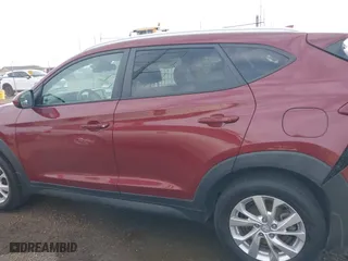 2019 Hyundai Tucson Value with VIN KM8J33A42KU861329, listed as a IAAI auction lot 41679185 with 65,304 mi miles. Bid and sale history available at carsss.com. Image 14.