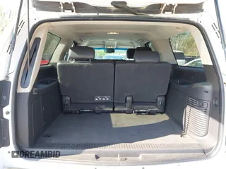 2013 Chevrolet Suburban LT with VIN 1GNSKJE75DR174167, listed as a IAAI auction lot 42005614 with 290,223 mi miles and . Bid and sale history available at DreamBid. Image 18.