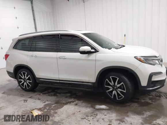 2019 Honda Pilot Touring 7-Passenger with VIN 5FNYF6H64KB005798, listed as a IAAI auction lot 41551933 with 103,151 mi miles. Bid and sale history available at carsss.com. Image 13.
