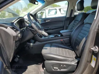 2016 Ford Edge SEL z VIN 2FMPK4J80GBC17489, wystawiony jako Copart lot #58372985 z przebiegiem 131 423 mil mil oraz Szkoda całkowita • Salvage title. Historia ofert i sprzedaży dostępna na DreamBid. Obrazek 7.