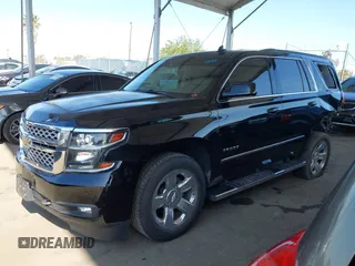 2016 Chevrolet Tahoe LT with VIN 1GNSKBKC5GR481043, listed as a IAAI auction lot 41968681 with 156,172 mi miles and . Bid and sale history available at DreamBid. Image 2.