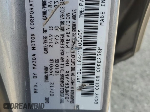 2012 Mazda 3 i Touring with VIN JM1BL1L84C1700805, listed as a Copart auction lot 61865075 with 77,538 mi miles and Salvage title. Bid and sale history available at DreamBid. Image 14.