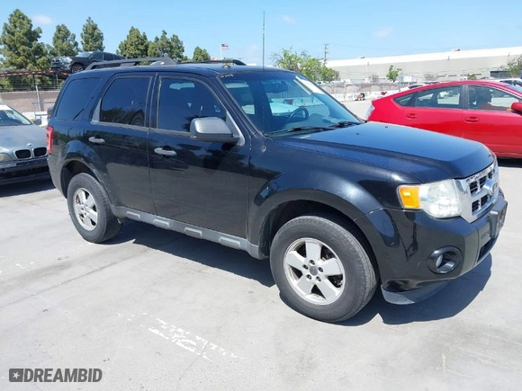 2012 Ford Escape XLT with VIN 1FMCU0D71CKC10734, listed as a IAAI auction lot 42065049 with 207,698 mi miles. Bid and sale history available at carsss.com. Image 1.