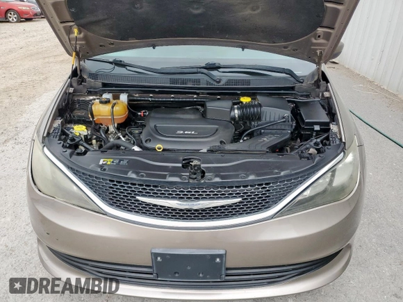 2017 Chrysler Pacifica Touring with VIN 2C4RC1DGXHR577647, listed as a Copart auction lot 57860695 with 138,936 mi miles and Clean title. Bid and sale history available at DreamBid. Image 12.