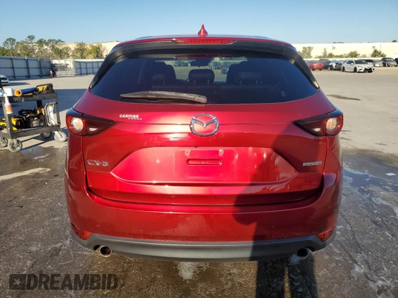 2021 Mazda CX-5 Touring with VIN JM3KFACM7M0393536, listed as a Copart auction lot 48488375 with 76,915 mi miles and Non Repairable. Bid and sale history available at DreamBid. Image 6.