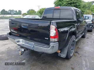 2014 Toyota Tacoma with VIN 5TFLU4EN5EX101434, listed as a IAAI auction lot 42273927 with 216,394 mi miles and . Bid and sale history available at DreamBid. Image 4.
