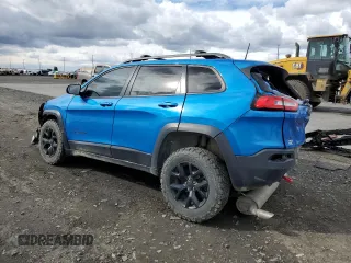 2018 Jeep Cherokee Trailhawk with VIN 1C4PJMBXXJD509312, listed as a Copart auction lot 50838495 with 115,060 mi miles and Salvage Title. Bid and sale history available at carsss.com. Image 2.