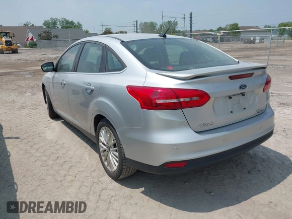 2015 Ford Focus Titanium с VIN 1FADP3J24FL280341, выставлен на аукционе IAAI как лот 42433208 с пробегом 151 813 миль миль и . История ставок и продаж доступна на DreamBid. Изображение 3.