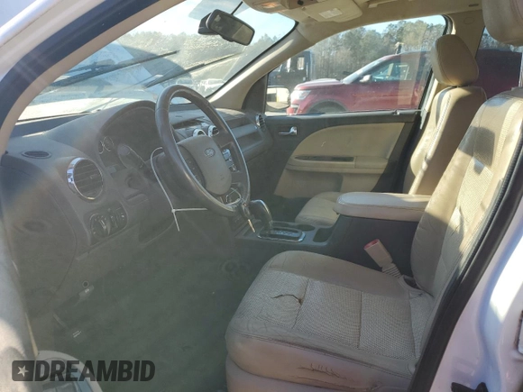 2008 Ford Taurus X Eddie Bauer with VIN 1FMDK07W78GA16734, listed as a Copart auction lot 86011354 with 214,429 mi miles and Salvage title. Bid and sale history available at DreamBid. Image 7.