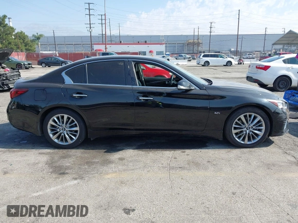 2018 Infiniti Q50 Luxe with VIN JN1EV7AP9JM358741, listed as a IAAI auction lot 42644098 with 101,553 mi miles and . Bid and sale history available at DreamBid. Image 14.