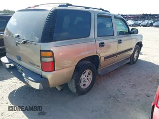 2005 Chevrolet Tahoe LS with VIN 1GNEC13V65J249079, listed as a IAAI auction lot 42127866 with 243,705 mi miles. Bid and sale history available at carsss.com. Image 4.