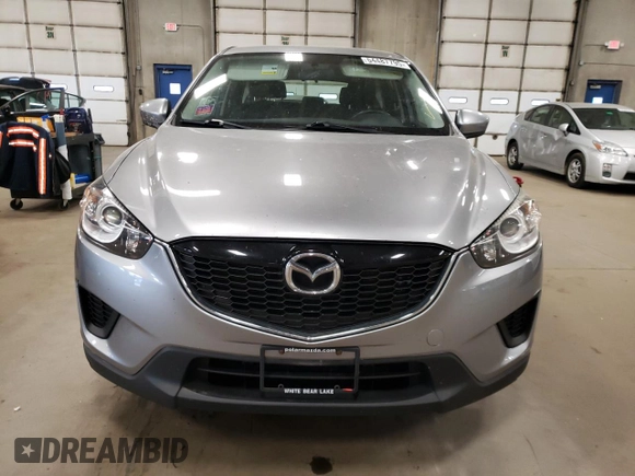 2013 Mazda CX-5 Sport z VIN JM3KE2BE4D0137115, wystawiony jako Copart lot #54487795 z przebiegiem 154 111 mil mil oraz Szkoda całkowita • Salvage title. Historia ofert i sprzedaży dostępna na DreamBid. Obrazek 5.