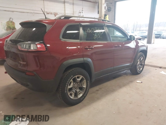 2019 Jeep Cherokee Trailhawk z VIN 1C4PJMBX0KD361981, wystawiony jako IAAI lot #42074093 z przebiegiem 56 989 mil mil oraz . Historia ofert i sprzedaży dostępna na DreamBid. Obrazek 4.