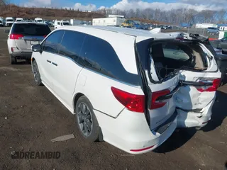 2024 Honda Odyssey Elite with VIN 5FNRL6H90RB028139, listed as a IAAI auction lot 41666330 with 8,516 mi miles and . Bid and sale history available at DreamBid. Image 3.