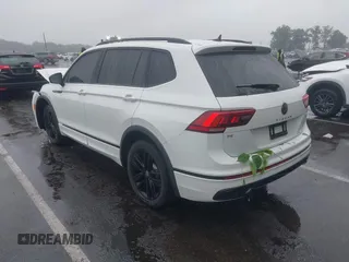 2022 Volkswagen Tiguan SE R-Line Black with VIN 3VV8B7AX6NM027050, listed as a IAAI auction lot 42463714 with 45,303 mi miles and . Bid and sale history available at DreamBid. Image 3.
