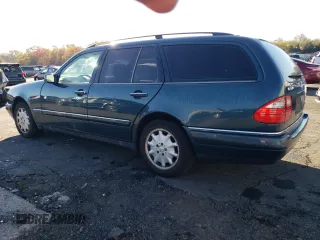 1999 Mercedes-Benz E-Class with VIN WDBJH82F4XX026758, listed as a Copart auction lot 76740804 with 136,782 mi miles and Salvage Title. Bid and sale history available at carsss.com. Image 2.
