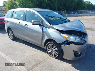 2012 Mazda 5 Sport with VIN JM1CW2BLXC0129303, listed as a IAAI auction lot 42556899 with 200,863 mi miles and . Bid and sale history available at DreamBid. Image 1.