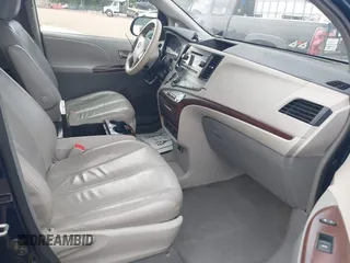 2011 Toyota Sienna XLE AAS with VIN 5TDYK3DC6BS045303, listed as a IAAI auction lot 42515203 with 205,904 mi miles and . Bid and sale history available at DreamBid. Image 5.