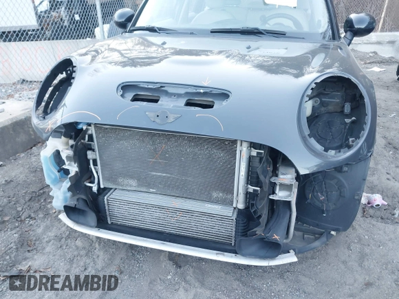 2016 MINI Cooper Hardtop 4 Door S with VIN WMWXU3C56G2B63682, listed as a IAAI auction lot 41244676 with 110,902 mi miles. Bid and sale history available at carsss.com. Image 6.
