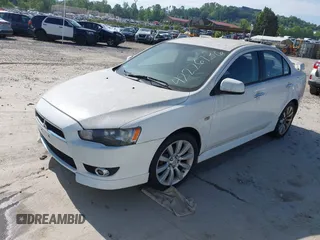 2011 Mitsubishi Lancer GTS with VIN JA32U8FW8BU030591, listed as a IAAI auction lot 42226736 with 110,010 mi miles and . Bid and sale history available at carsss.com. Image 2.