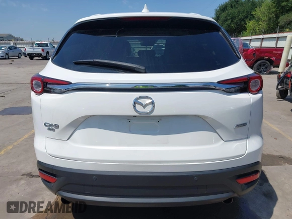 2019 Mazda CX-9 Touring z VIN JM3TCBCY2K0300702, wystawiony jako IAAI lot #42194050 z przebiegiem 98 247 mil mil oraz . Historia ofert i sprzedaży dostępna na DreamBid. Obrazek 16.