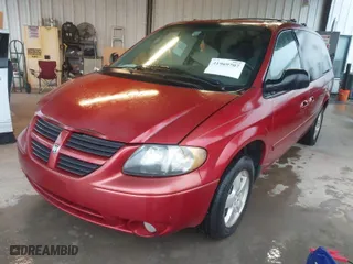 2005 Dodge Caravan SXT with VIN 2D4GP44LX5R517358, listed as a IAAI auction lot 41969707 with 283,958 mi miles. Bid and sale history available at carsss.com. Image 2.