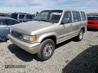 1994 Isuzu Trooper z VIN JACDH58V7R7929502, wystawiony jako Copart lot #70280554 z przebiegiem 243 827 mil mil oraz Tytuł czysty. Historia ofert i sprzedaży dostępna na DreamBid. Obrazek 1.