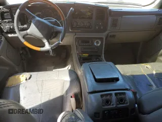 2002 Cadillac Escalade z VIN 1GYEK63N82R329743, wystawiony jako Copart lot #56587295 z przebiegiem 215 694 mil mil oraz Szkoda całkowita • Salvage title. Historia ofert i sprzedaży dostępna na DreamBid. Obrazek 8.