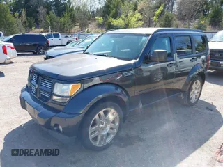2011 Dodge Nitro Heat with VIN 1D4PU4GK6BW549562, listed as a IAAI auction lot 41992334 with 137,481 mi miles. Bid and sale history available at carsss.com. Image 1.