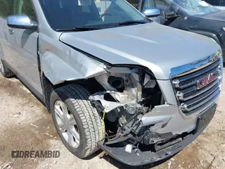 2017 GMC Terrain SLT z VIN 2GKFLUE31H6260426, wystawiony jako IAAI lot #42233364 z przebiegiem 133 711 mil mil oraz . Historia ofert i sprzedaży dostępna na DreamBid. Obrazek 6.