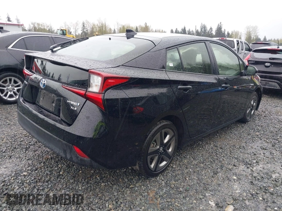 2022 Toyota Prius L Eco with VIN JTDKAMFU2N3154674, listed as a IAAI auction lot 41977505 with 61,552 mi miles and . Bid and sale history available at DreamBid. Image 4.