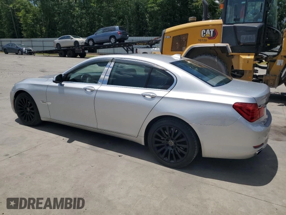 2012 BMW 7 Series 750i with VIN WBAKA8C50CDV99875, listed as a Copart auction lot 61663985 with 145,289 mi miles and Clean title. Bid and sale history available at DreamBid. Image 2.