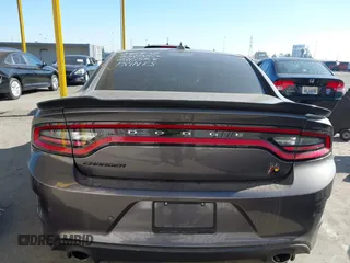 2019 Dodge Charger Scat Pack with VIN 2C3CDXGJ2KH564051, listed as a IAAI auction lot 41255283 with 64,687 mi miles and . Bid and sale history available at DreamBid. Image 16.