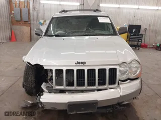 2009 Jeep Grand Cherokee Laredo with VIN 1J8GR48KX9C516873, listed as a IAAI auction lot 41610781 with 199,246 mi miles. Bid and sale history available at carsss.com. Image 12.