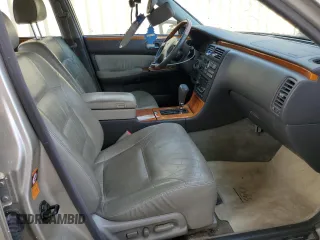 2000 Infiniti Q45 z VIN JNKBY31A0YM301297, wystawiony jako Copart lot #74672884 z przebiegiem 171 263 mil mil oraz Szkody całkowita. Historia ofert i sprzedaży dostępna na DreamBid. Obrazek 7.