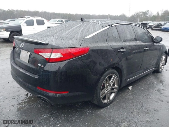 2013 Kia Optima SX w/Limited Pkg with VIN 5XXGR4A68DG189452, listed as a IAAI auction lot 41563636 with 131,241 mi miles. Bid and sale history available at carsss.com. Image 4.