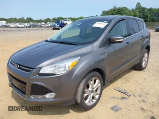 2013 Ford Escape SEL with VIN 1FMCU9H99DUC25469, listed as a IAAI auction lot 42402148 with 99,830 mi miles and . Bid and sale history available at DreamBid. Image 2.