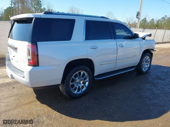 2016 GMC Yukon Denali with VIN 1GKS2CKJ7GR476072, listed as a IAAI auction lot 41611329 with 152,052 mi miles. Bid and sale history available at carsss.com. Image 4.