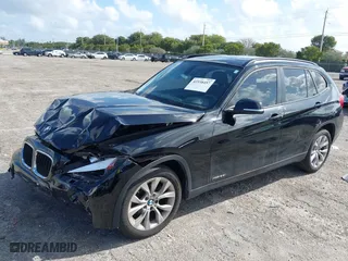 2014 BMW X1 xDrive28i with VIN WBAVL1C58EVY24362, listed as a IAAI auction lot 41938457 with 146,252 mi miles. Bid and sale history available at carsss.com. Image 18.