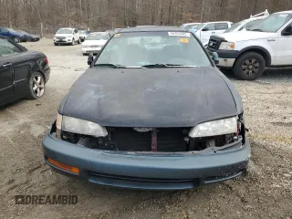 1996 Honda Accord EX with VIN 1HGCD5655TA028555, listed as a Copart auction lot 46263005 with 186,377 mi miles and Salvage Title. Bid and sale history available at DreamBid. Image 5.