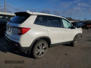 2019 Honda Passport EX-L z VIN 5FNYF8H57KB029404, wystawiony jako Copart lot #86810504 z przebiegiem Nie podano mil oraz Szkoda całkowita • Salvage title. Historia ofert i sprzedaży dostępna na DreamBid. Obrazek 3.