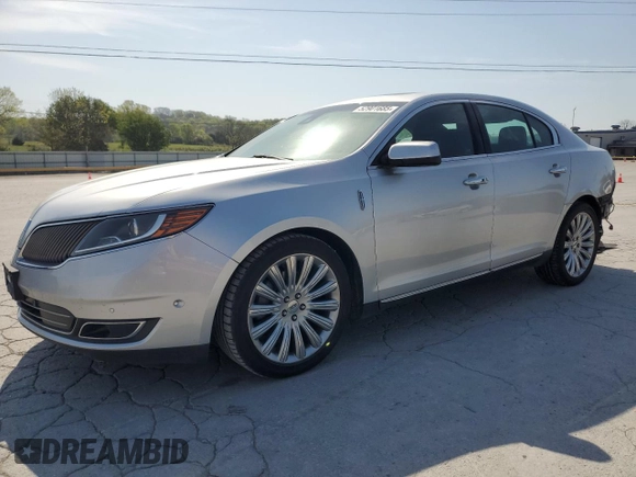 2013 Lincoln MKS with VIN 1LNHL9EK0DG612314, listed as a Copart auction lot 52901685 with 124,828 mi miles and Salvage title. Bid and sale history available at DreamBid. Image 1.