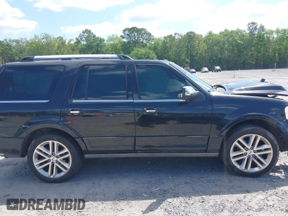 2015 Ford Expedition Platinum with VIN 1FMJU1MT1FEF12442, listed as a IAAI auction lot 42144296 with 150,759 mi miles and . Bid and sale history available at DreamBid. Image 13.