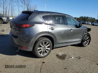 2021 Mazda CX-5 Grand Touring with VIN JM3KFBDM1M0489859, listed as a Copart auction lot 48688905 with 36,882 mi miles and Salvage Title. Bid and sale history available at DreamBid. Image 3.