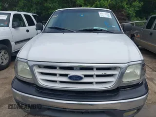 2002 Ford F-150 XL with VIN 1FTRX17202NA10047, listed as a IAAI auction lot 42122396 with 1 mi miles. Bid and sale history available at carsss.com. Image 6.