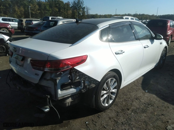 2017 Kia Optima EX with VIN 5XXGU4L32HG156941, listed as a IAAI auction lot 40299001 with 128,592 mi miles. Bid and sale history available at carsss.com. Image 4.